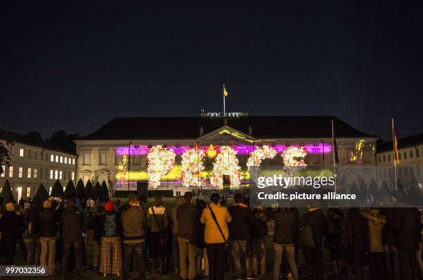 Bellevue Palace lit up ahead of the Festival of Lights in Berlin, Germany, 06 October 2017. Photo: Paul Zinken/dpa