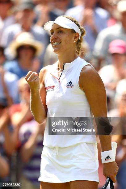 Angelique Kerber of Germany celebrates match point against Jelena Ostapenko of Latvia during their Ladies' Singles semi-final match on day ten of the...