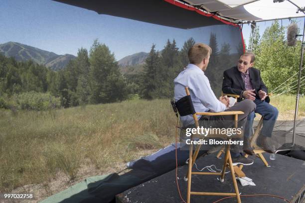 Michael Neidorff, chairman and chief executive officer of Centene Corp., right, speaks during a Bloomberg Television interview at the Allen & Co....