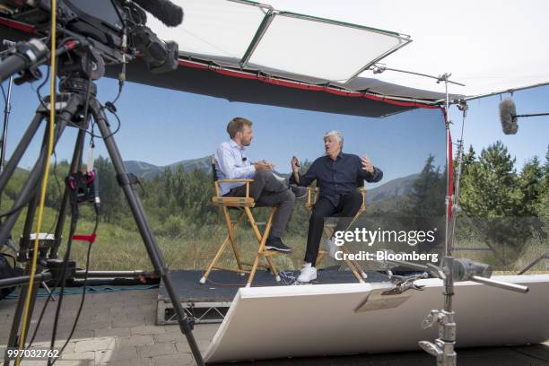 Maurice Levy, chairman of the supervisory board of Publicis Groupe SA, right, speaks during a Bloomberg Television interview at the Allen & Co. Media...