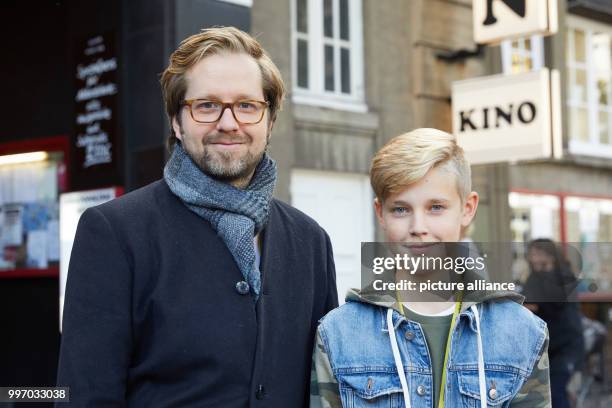 Norwegian film director Torfinn Iversen and Norwegian youth actor Odin Eikre arriving to the Abaton Cinema for the "Michel" Children and Youth Film...