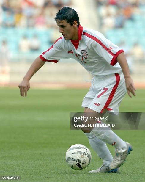 Tunisian player Chawki Ben Saada is pictured during the World Cup 2006 Africain group 5 qualifyng football match against Guinea at Rades stadium 11...