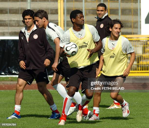 Tunisian defender Radhi Jaidi , Tunisian forward Chawki Ben Saada and Tunisian defender Karim Haggui during a training session at Saks Stadium in...