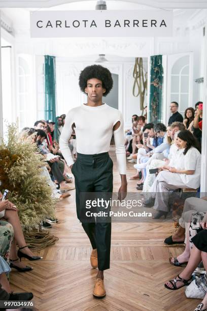 Model walks the runway during the Carlota Barrera show at Mercedes Benz Fashion Week Madrid Spring/ Summer 2019 on July 12, 2018 in Madrid, Spain.