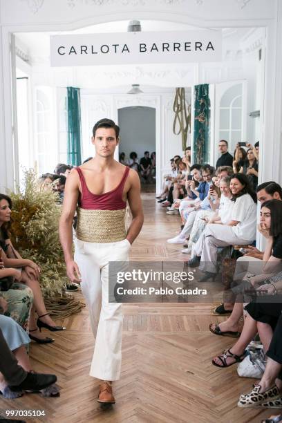 Model walks the runway during the Carlota Barrera show at Mercedes Benz Fashion Week Madrid Spring/ Summer 2019 on July 12, 2018 in Madrid, Spain.