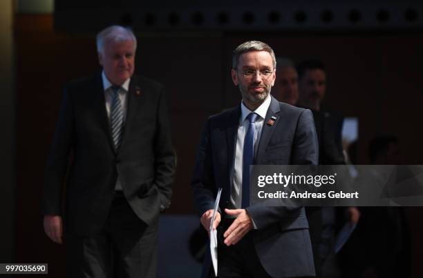 Herbert Kickl , Interior Minister of Austria, and Horst Seehofer, Interior Minister of Germany, arrive at a press conference during the European...