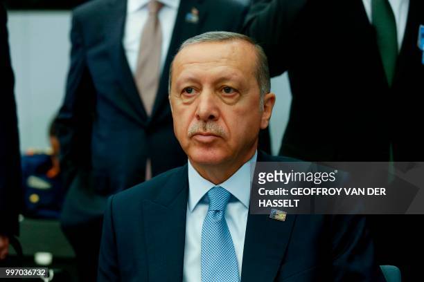 Turkey's President Recep Tayyip Erdogan attends the second day of the NATO summit, in Brussels, on July 12, 2018.