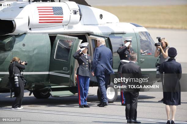 President Donald Trump boards the Marine One helicopter at Stansted Airport, north of London on July 12 for transit as he begins his first visit to...