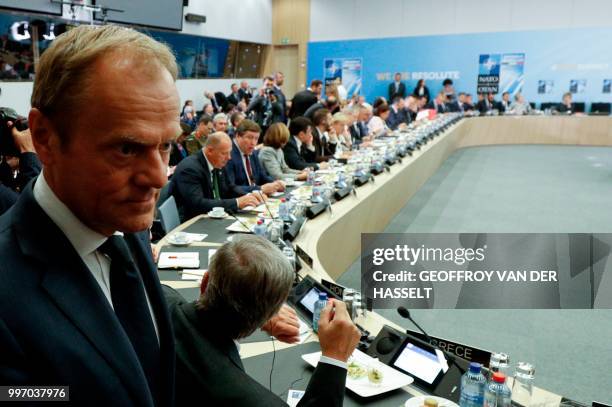 European Council President Donald Tusk arrives to attend the second day of the NATO summit, in Brussels, on July 12, 2018.