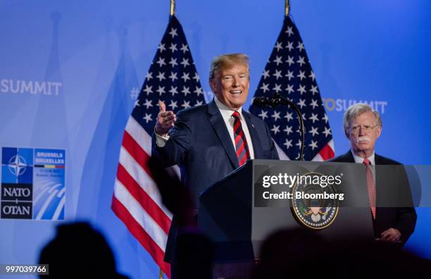 President Donald Trump gestures while speaking during a news conference at the North Atlantic Treaty Organization summit in Brussels, Belgium, on...