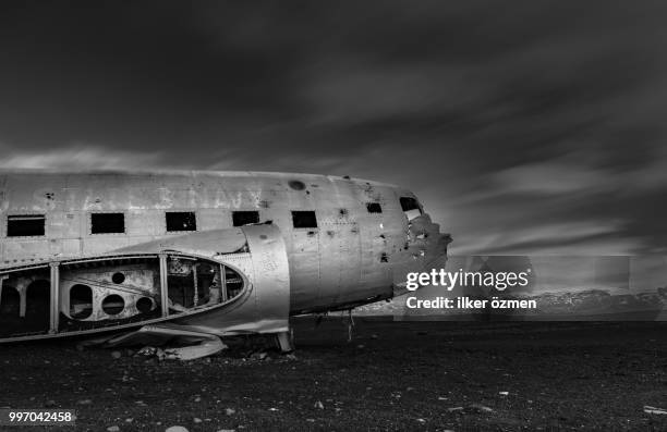 the abandoned plane / iceland - plane engine stock-fotos und bilder