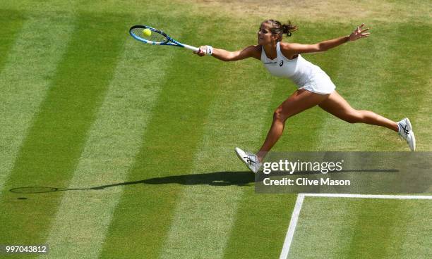 Julia Goerges of Germany returns against Serena Williams of The United States during their Ladies' Singles semi-final match on day ten of the...