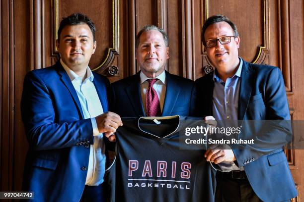 Jean Francois Martins, deputy mayor of Paris in charge of sport, David Kahn, CEO of Paris Basketball Investments and Romuald Coustre new general...