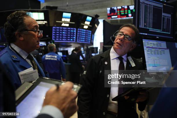 Traders work on the floor of the New York Stock Exchange on July 12, 2018 in New York City. As fears of a trade war eased with China, the Dow Jones...