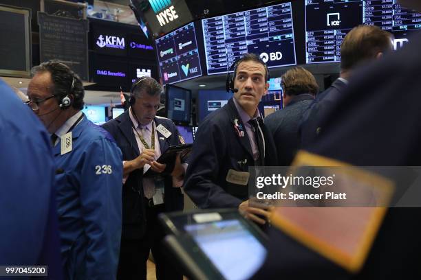 Traders work on the floor of the New York Stock Exchange on July 12, 2018 in New York City. As fears of a trade war eased with China, the Dow Jones...