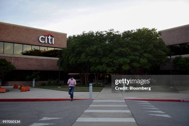 An employee exits from a Citibank Operations Center in San Antonio, Texas, U.S., on Wednesday, July 11, 2018. Citigroup Inc. Is scheduled to release...