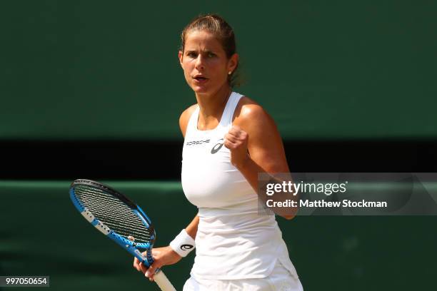 Julia Goerges of Germany celebrates a point against Serena Williams of The United States during their Ladies' Singles semi-final match on day ten of...