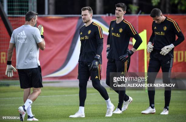 Belgium's goalkeeper Simon Mignolet , Belgium's goalkeeper Thibaut Courtois and Belgium's goalkeeper Koen Casteels attend a training session in...
