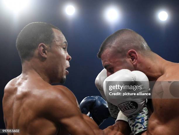 Chris Eubank Jr. Of Great Britain and Turkey's Avni Yildirim engage in action at the super middleweight quarterfinals of the IBO Boxing World Cup in...