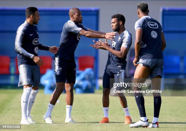 Nabil Fekir, Steven Nzonzi, Thomas Lemar and Presnel Kimpembe joke during a France trainig session on July 12, 2018 in Moscow, Russia.