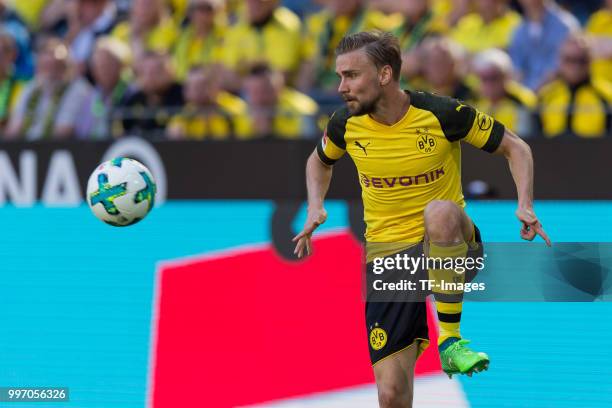 Marcel Schmelzer of Dortmund controls the ball during the Bundesliga match between Borussia Dortmund and 1. FSV Mainz 05 at Signal Iduna Park on May...