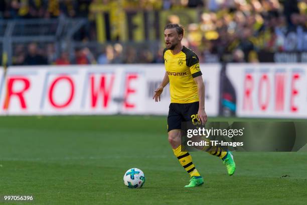 Marcel Schmelzer of Dortmund controls the ball during the Bundesliga match between Borussia Dortmund and 1. FSV Mainz 05 at Signal Iduna Park on May...