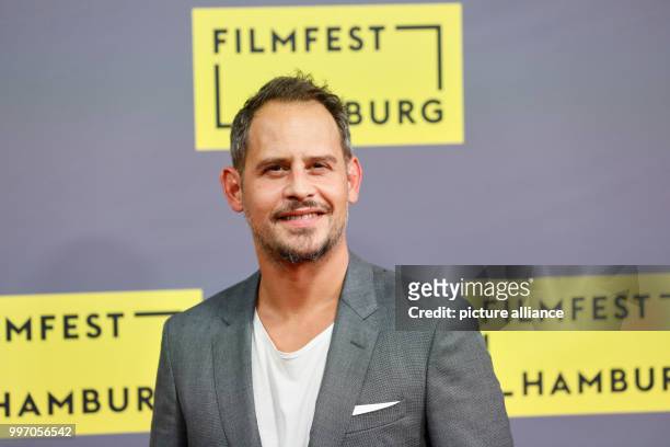 Actor Moritz Bleibtreu arrives for the German premiere of the film "Nur Gott kann mich richten" during the Hamburg Film Festival in Hamburg, Germany,...