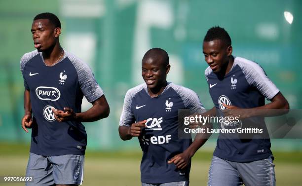 Paul Pogba, Ngolo Kante and Blaise Matuidi warm up during a France trainig session on July 12, 2018 in Moscow, Russia.