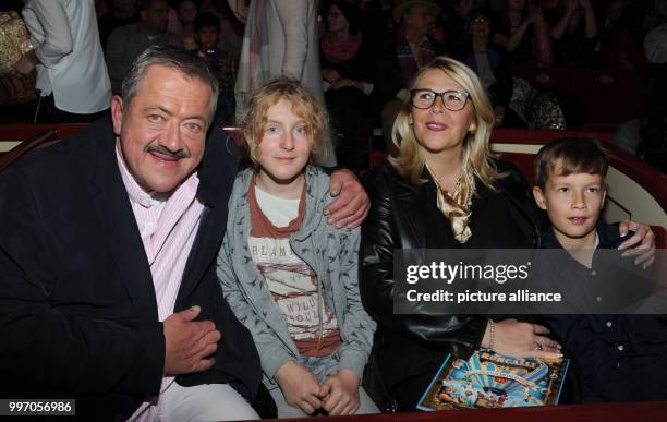 The actor Joseph Hannesschlaeger, his godchild Franziska, his partner Bettina Geyer and her godchild Philipp pose during the premiere gala of Circus...