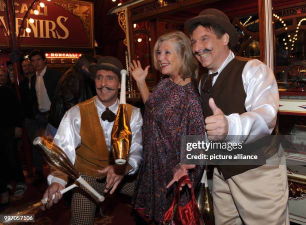 The actress Jutta Speidel and artists smile and pose during the premiere gala of Circus Roncalli under the slogan "40 years of traveling towards the...