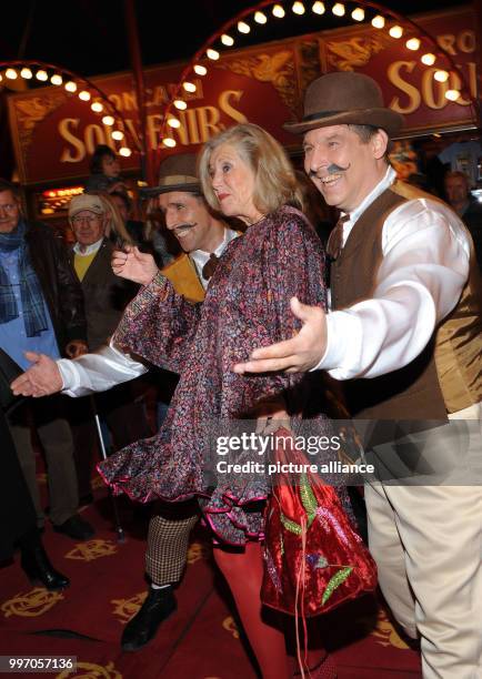 The actress Jutta Speidel and artists smile and pose during the premiere gala of Circus Roncalli under the slogan "40 years of traveling towards the...