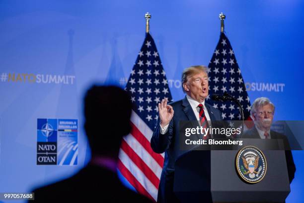 President Donald Trump gestures while speaking during a news conference at the North Atlantic Treaty Organization summit in Brussels, Belgium, on...