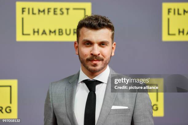 The actor Edin Hasanovic arrives for the German premiere of the film "Nur Gott kann mich richten" during the Hamburg Film Festival in Hamburg,...