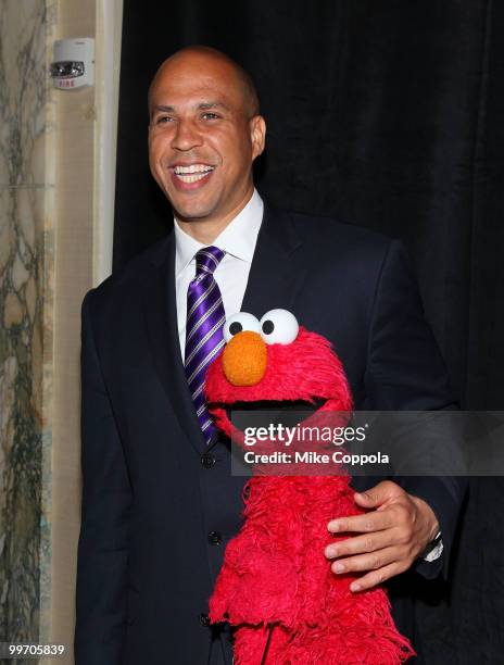 Newark New Jersey Mayor Cory Booker Elmo attend the 69th Annual Peabody Awards at The Waldorf Astoria on May 17, 2010 in New York City.