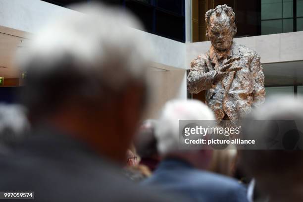 Numerous people partake in a memorial event in honour of former German chancellor Willy Brandt's 25th death anniversary at the Willy Brandt House in...