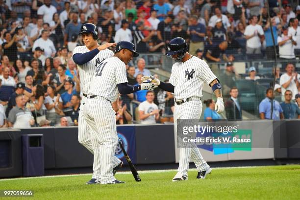 New York Yankees Aaron Hicks , Miguel Andujar and Gleyber Torres during game vs Boston Red Sox at Yankee Stadium. Bronx, NY 7/1/2018 CREDIT: Erick W....