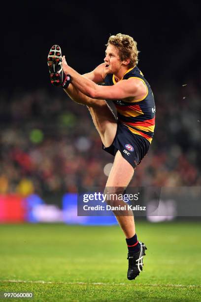 Rory Sloane of the Crows kicks the ball during the round 17 AFL match between the Adelaide Crows and the Geelong Cats at Adelaide Oval on July 12,...