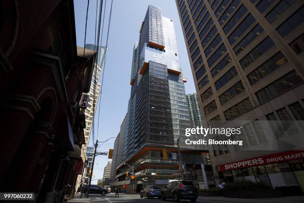 The GWL Realty Advisors Livmore luxury apartment building stands under construction in Toronto, Ontario, Canada, on Tuesday, July 10, 2018. Toronto's...
