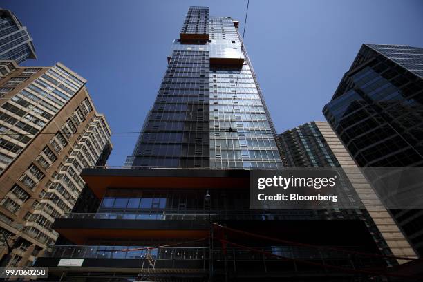 The GWL Realty Advisors Livmore luxury apartment building stands under construction in Toronto, Ontario, Canada, on Tuesday, July 10, 2018. Toronto's...