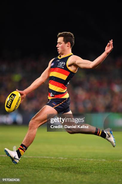 Luke Brown of the Crows kicks the ball during the round 17 AFL match between the Adelaide Crows and the Geelong Cats at Adelaide Oval on July 12,...
