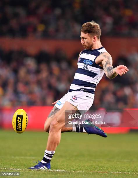 Zach Tuohy of the Cats kicks the ball during the round 17 AFL match between the Adelaide Crows and the Geelong Cats at Adelaide Oval on July 12, 2018...