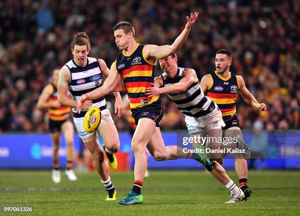 Josh Jenkins of the Crows kicks the ball during the round 17 AFL match between the Adelaide Crows and the Geelong Cats at Adelaide Oval on July 12,...