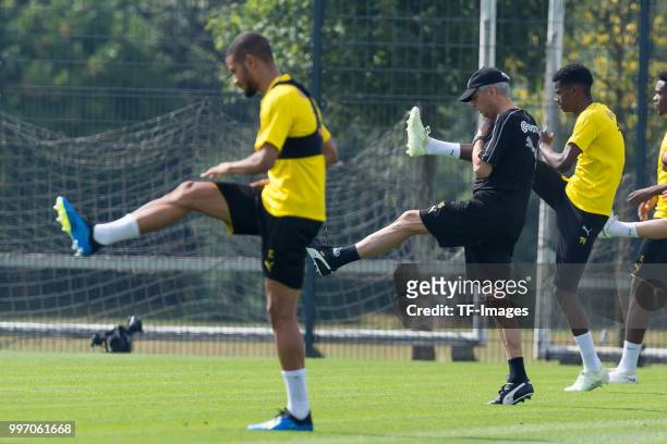 Head coach Lucien Favre of Dortmund controls the ball during a training session at BVB training center on July 12, 2018 in Dortmund, Germany.