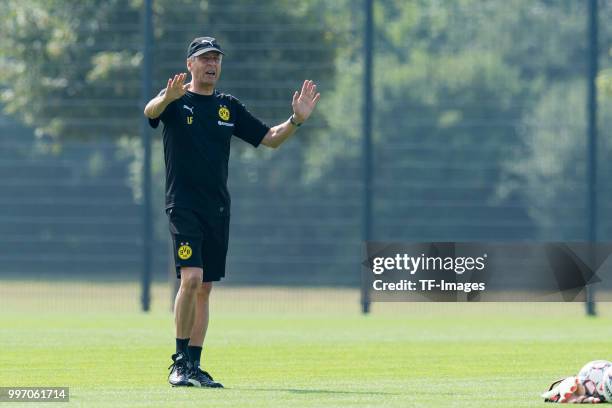 Head coach Lucien Favre of Dortmund gestures during a training session at BVB training center on July 12, 2018 in Dortmund, Germany.