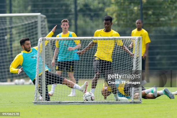 Nuri Sahin of Dortmund and Alexander Isak of Dortmund battle for the ball during a training session at BVB training center on July 12, 2018 in...