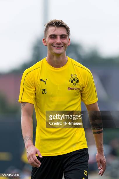 Maximilian Philipp of Dortmund laughs during a training session at BVB training center on July 12, 2018 in Dortmund, Germany.