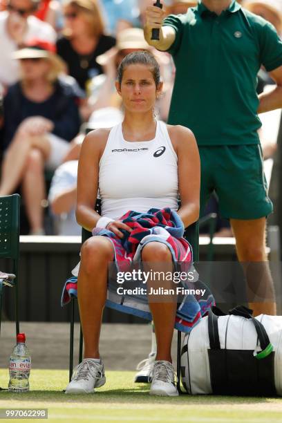 Julia Goerges of Germany reacts during a break in play against Serena Williams of The United States in their Ladies' Singles semi-final match on day...