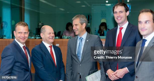 From Left: Finnish Finance Minister Petteri Orpo is talking with the German Federal Minister of Finance Olaf Scholz, the Austrian Finance Minister...