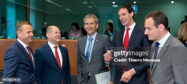 From Left: Finnish Finance Minister Petteri Orpo is talking with the German Federal Minister of Finance Olaf Scholz, the Austrian Finance Minister...