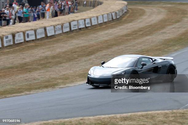The McLaren 600LT supercar, manufactured by McLaren Automotive Ltd., performs a demonstration lap during its launch at the Goodwood Festival of Speed...